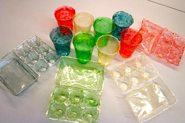 Color bioplastic cups and egg cartons